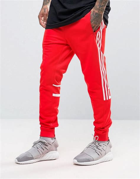 red adidas original joggers